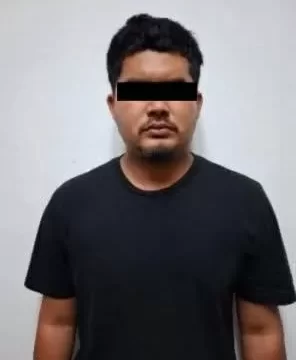 Fiscalía de Oaxaca detiene a una persona con armas de fuego, chalecos tácticos, y varios teléfonos celulares, en la región de la Cuenca